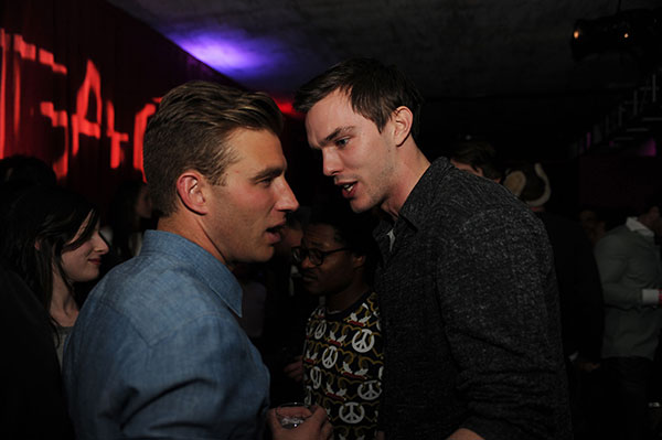 Nicholas-Hoult-chats-with-a-friend-at-TAO-at-Village-at-the-Lift-with-Moet-&-Chandon-and-Stella-Artois